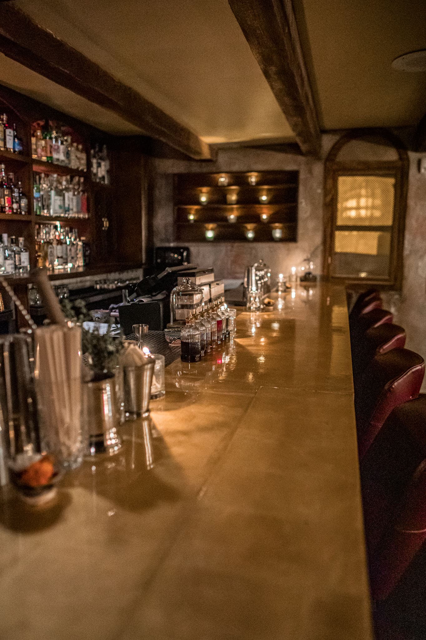 The back bar and whiskey wall at Oculto 477